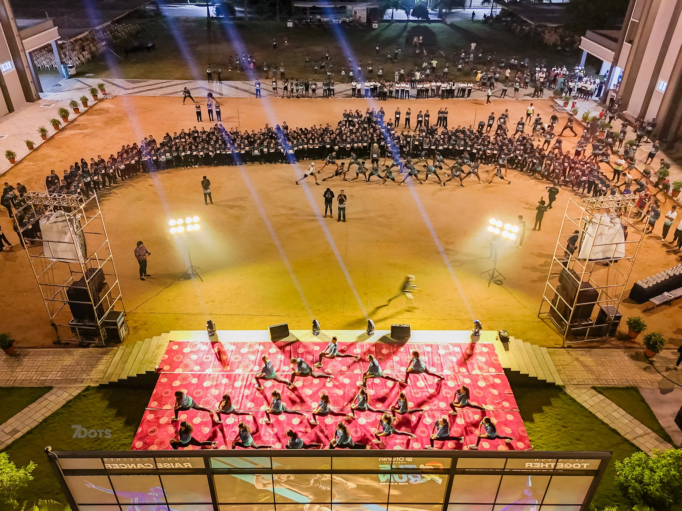 Aerial view of the first-edition gathering and stage before sunrise.