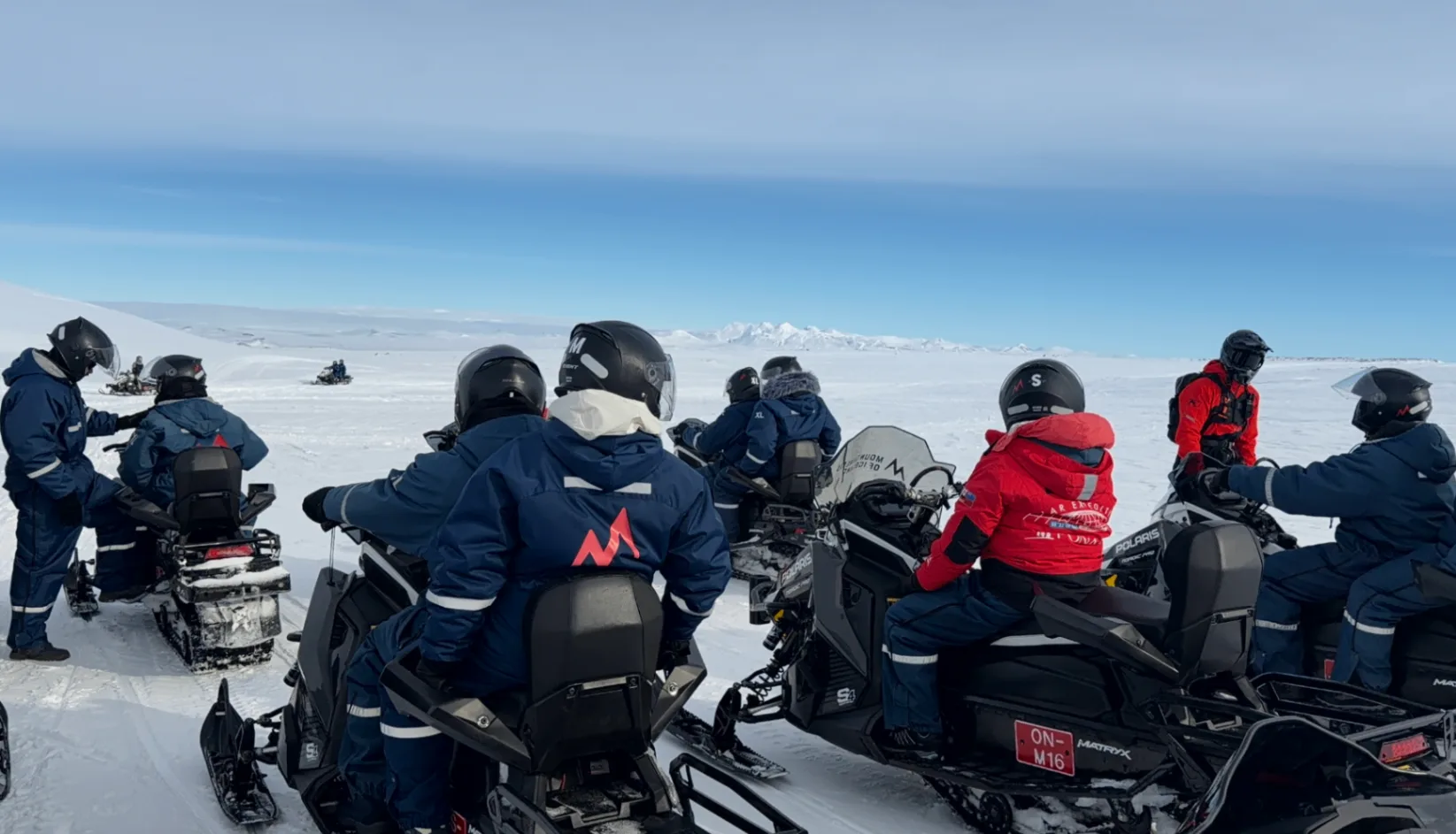 Group on snowmobiles on an Icelandic glacier