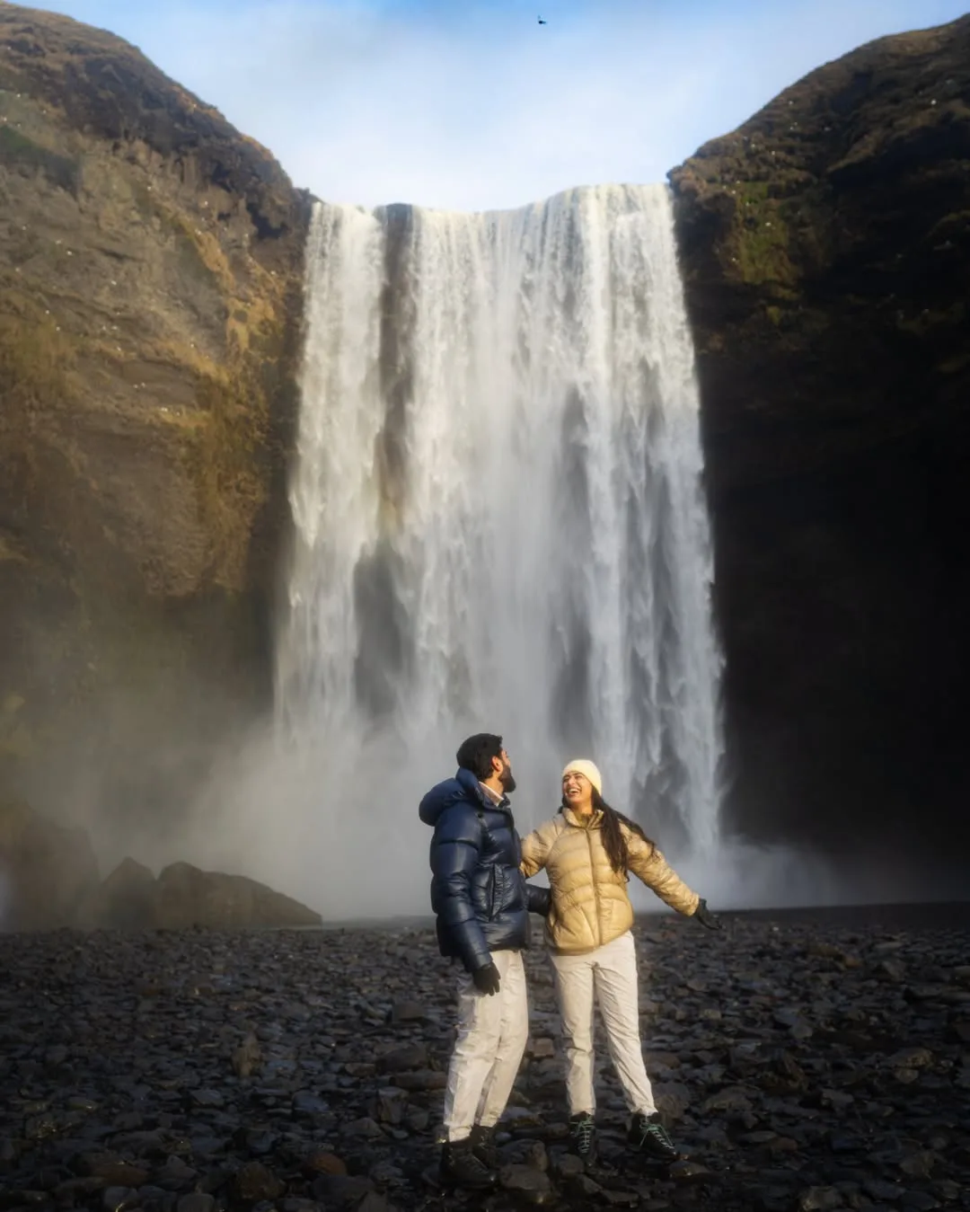 Couple at Skógafoss waterfall